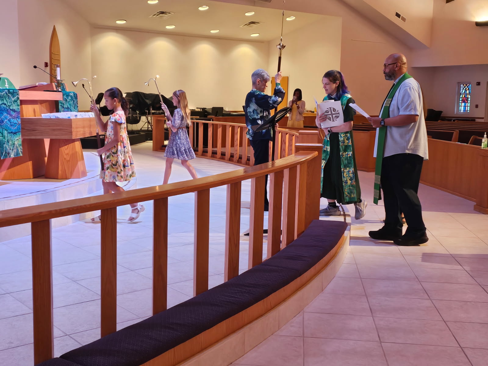 traditional service with 2 children acolyting in the processional